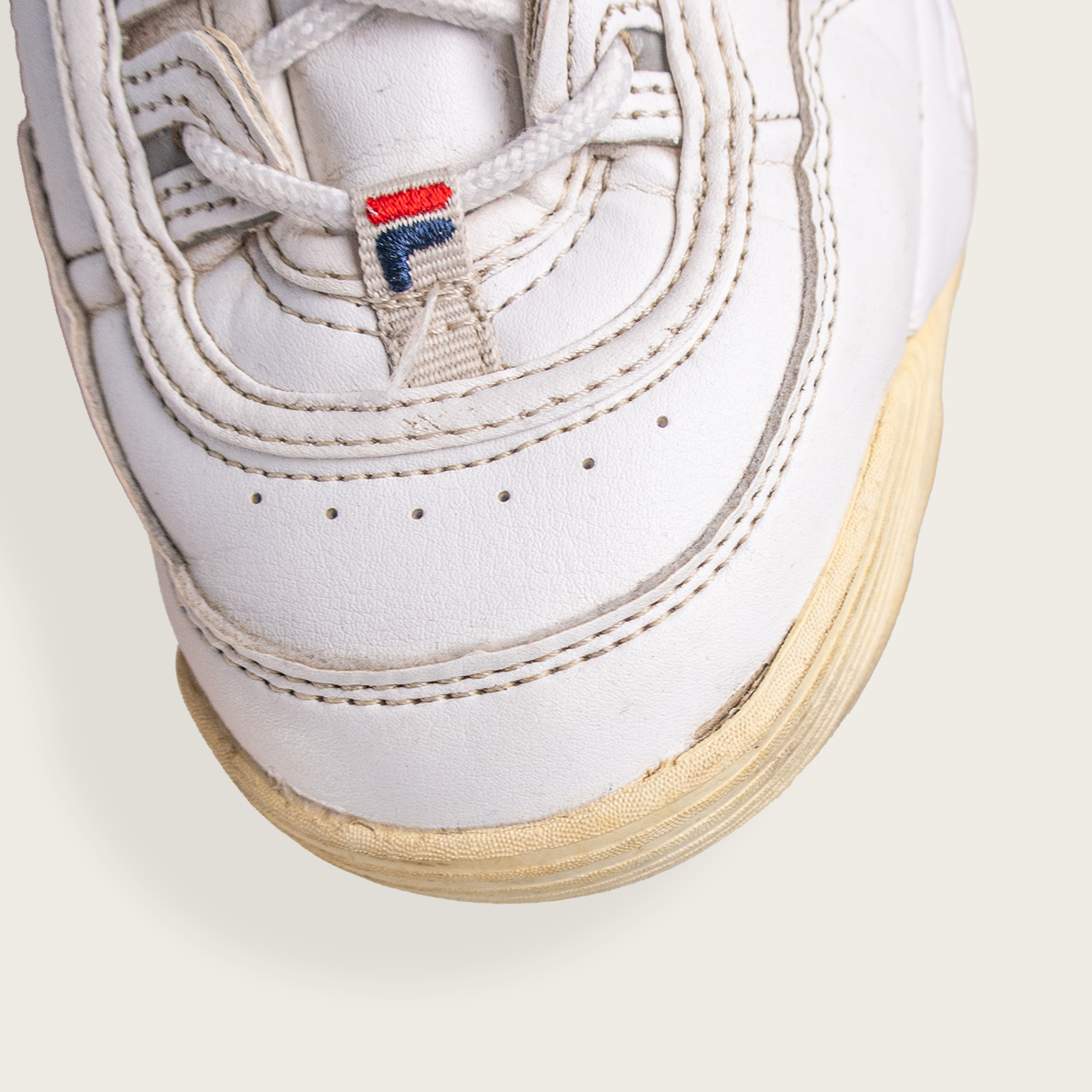 Women's White FILA Disruptor Casual Sneaker - US 8